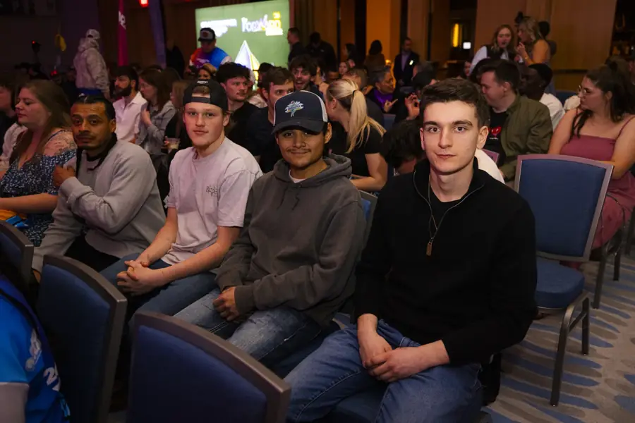 Young teammates in the audience at Camp Forward '26